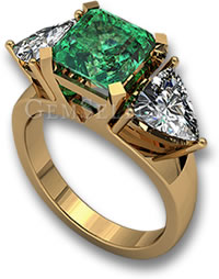 Anillo de compromiso de tres piedras con esmeralda y diamantes