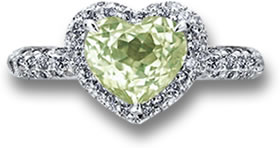 Anillo de zafiro amarillo en forma de corazón con diseño de halo