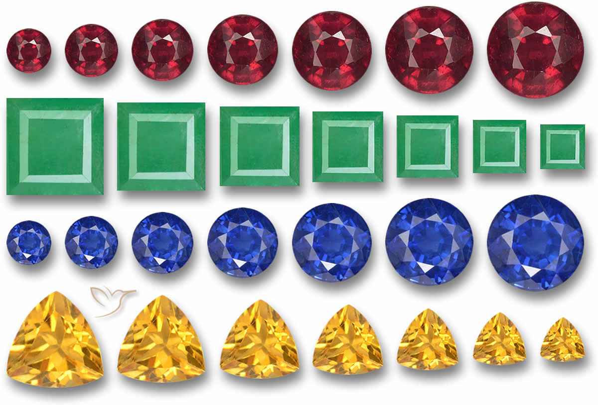 Piedras preciosas sueltas dispuestas con monturas de joyería estándar.