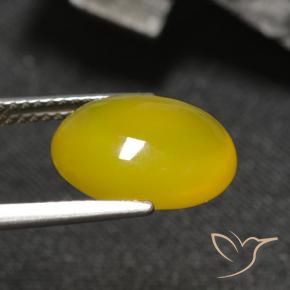 Ágata Dorado amarillento natural de 4.04 ct, Ovalada, Translúcido