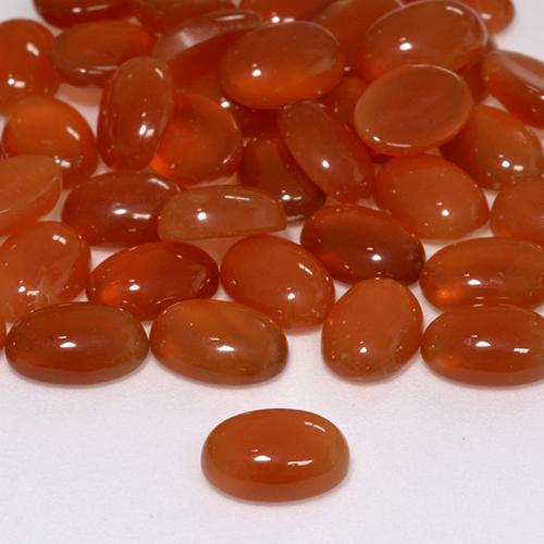 Ágata Rojo fuego natural de 0.63 ct, Ovalada, Translúcido