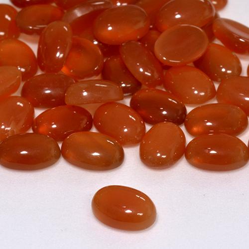 Ágata Rojo fuego natural de 0.63 ct, Ovalada, Translúcido