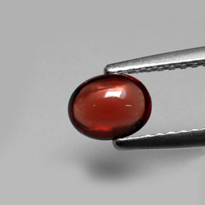 granate almandino Roja Anaranjada natural de 0.77 ct, Corte Óvalo, Translúcido
