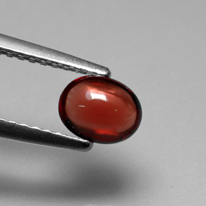 granate almandino Roja Anaranjada natural de 0.77 ct, Corte Óvalo, Translúcido