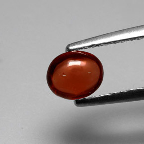 granate almandino Roja Anaranjada natural de 0.88 ct, Corte Óvalo, Translúcido