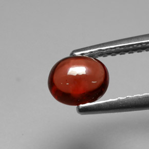 granate almandino Roja Anaranjada natural de 0.88 ct, Corte Óvalo, Translúcido