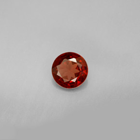 granate almandino Roja Anaranjada natural de 0.77 ct, Corte Redondo, VVS-VS