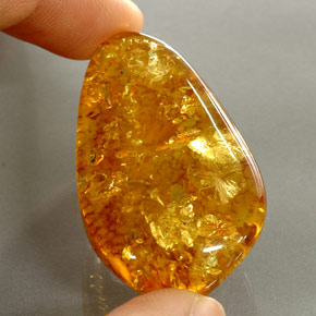 Ámbar naranja natural de 30,46 ct, transparente, transparente / translúcido