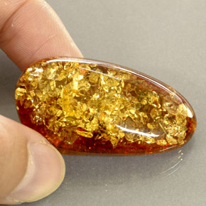 Ámbar naranja natural de 25,46 ct, transparente, transparente / translúcido