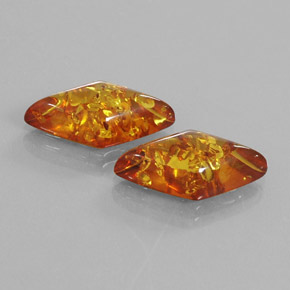 Gemas de ámbar naranja natural de  ct, forma elegante, transparente