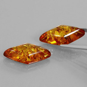 Gemas de ámbar naranja natural de  ct, forma elegante, transparente