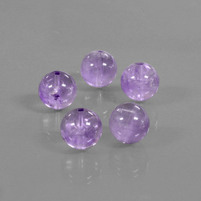 Gemas de amatista violeta iris intenso natural de 34,90 ct, esfera / bola, transparente