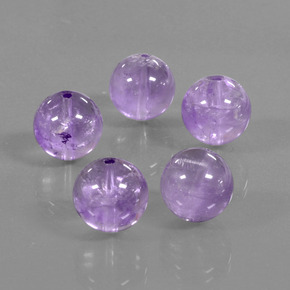 Gemas de amatista violeta iris intenso natural de 34,90 ct, esfera / bola, transparente