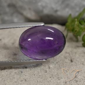 Amatista Violeta medio natural de 6.07 ct, Ovalada, Transparente