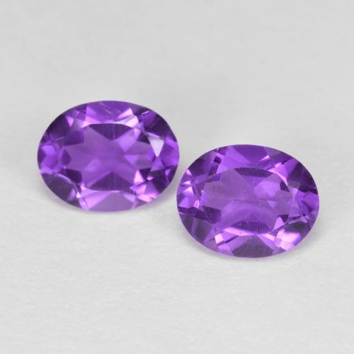 Gemas de Amatista Violeta oscuro medio natural de 0.62 ct, Corte Óvalo, VVS-VS