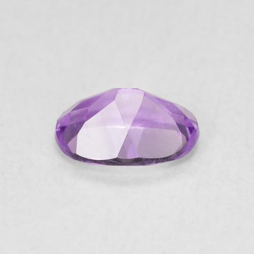 Amatista Violeta rosado natural de 0.63 ct, Ovalada, VS