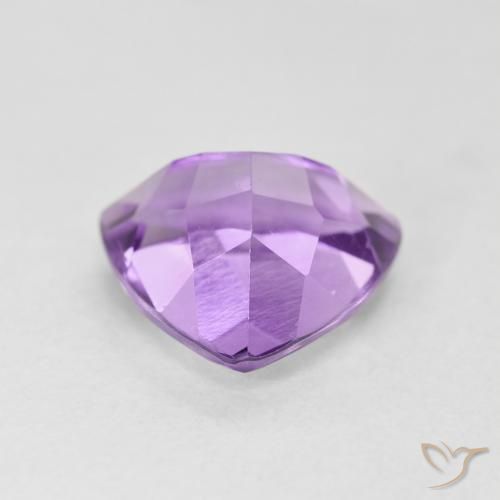 Amatista Violeta rosáceo medio natural de 3.01 ct, Trillón, VS