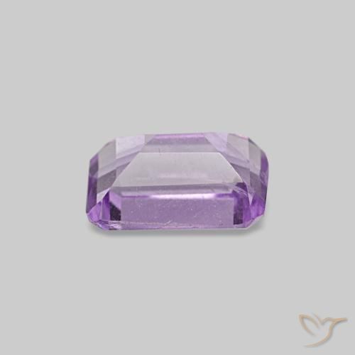 Amatista Violeta rosado medio natural de 0.49 ct, corte esmeralda, VS