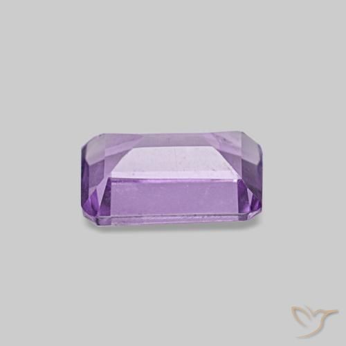 Amatista Violeta rosado medio natural de 0.49 ct, corte esmeralda, VS