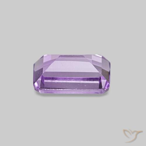 Amatista Violeta rosáceo medio natural de 0.53 ct, corte esmeralda, VS