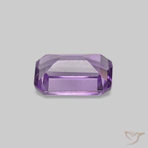 Amatista Violeta rosado natural de 0.52 ct, corte esmeralda, VS