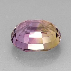 Ametrino bicolor natural de 21,12 ct, corte óvalo, VVS
