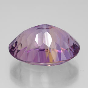 Ametrino bicolor natural de 10,85 ct, corte óvalo, VVS