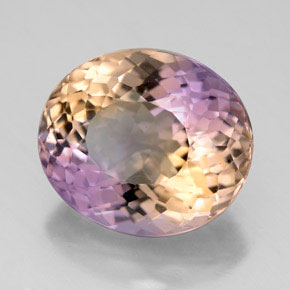 Ametrino bicolor natural de 8,50 ct, corte óvalo, VS