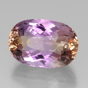 Ametrino bicolor natural de 16,93 ct, corte óvalo, VS
