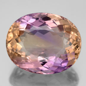 Ametrino bicolor natural de 12,15 ct, corte óvalo, VS