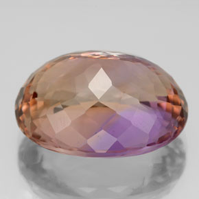 Ametrino bicolor natural de 12,15 ct, corte óvalo, VS