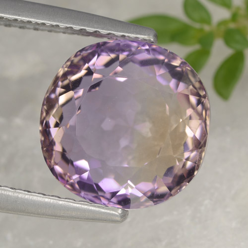 Ametrino bicolor natural de 5,22 ct, corte óvalo, VVS