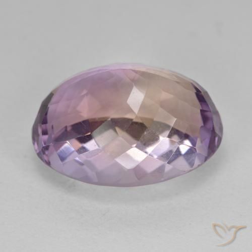 Ametrino Bicolor natural de 19.73 ct, Ovalada, VVS