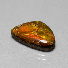 Ammolita multicolor natural de 5,71 ct, forma elegante, opaco
