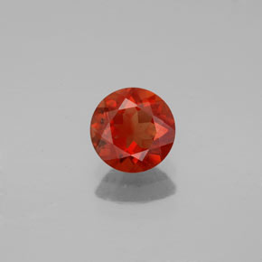 Labradorita Andesina Naranja rojizo natural de 0.67 ct, Corte Redondo, VS-SI