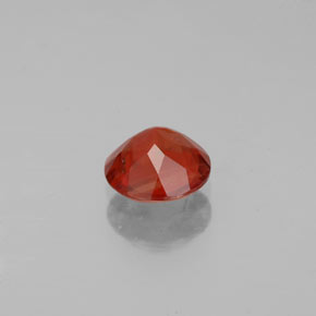 Labradorita Andesina Naranja rojizo natural de 0.67 ct, Corte Redondo, VS-SI