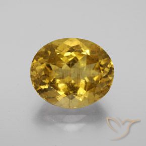 7.36ct Natural Dorado marrón Apatito, Ovalada, VS-SI