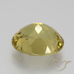 Apatito Amarillo amarronado natural de 6.53 ct, Ovalada, VS