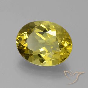 Apatito Amarillo amarronado natural de 6.66 ct, Ovalada, VS