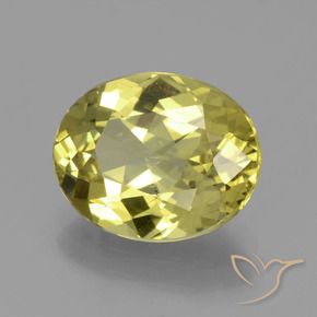 Apatito Amarillo piña natural de 4.67 ct, Ovalada, VS
