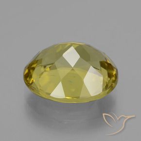 Apatito Amarillo amarronado natural de 9.01 ct, Ovalada, VS
