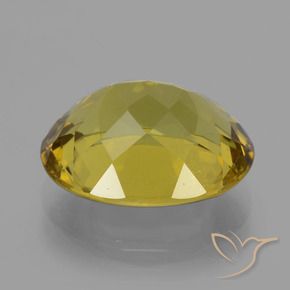 Apatito Amarillo dijón natural de 10.86 ct, Ovalada, VS