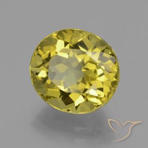 Apatito Amarillo púrpura natural de 5.33 ct, Ovalada, VS