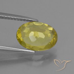 Apatito Amarillo piña natural de 2.59 ct, Ovalada, VS
