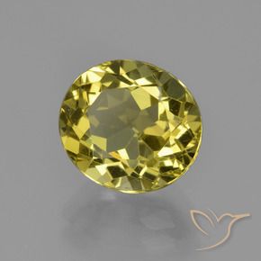 Apatito Amarillo amarronado natural de 3.43 ct, Ovalada, VS