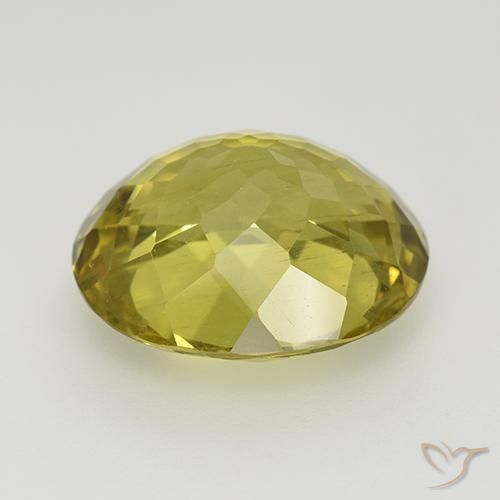 Apatito Amarillo púrpura natural de 8.48 ct, Ovalada, VS