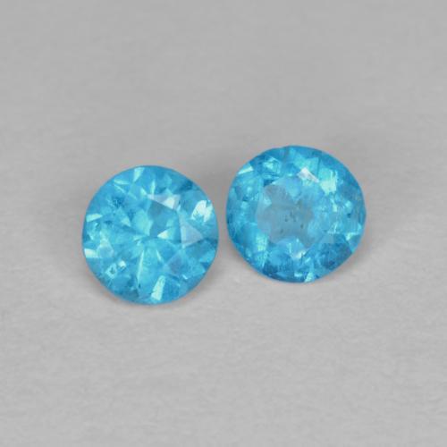 Gemas de Apatito Azul azur eléctrico natural de 0.30 ct, Corte Redondo, VS