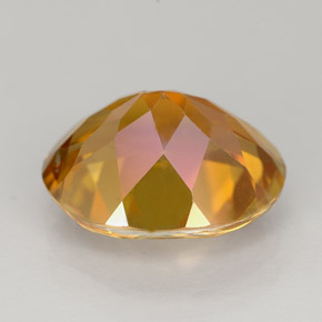 Topacio azotic multicolor natural de 5,63 ct, corte óvalo, VS
