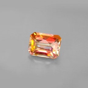 Topacio azotic multicolor natural de 1,98 ct, corte esmeralda, VS