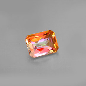 Topacio azotic multicolor natural de 1,92 ct, corte esmeralda, VS